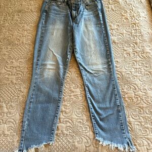 Paige denim mid waist fit frayed asymmetric bottom  22 inch on inner inseams